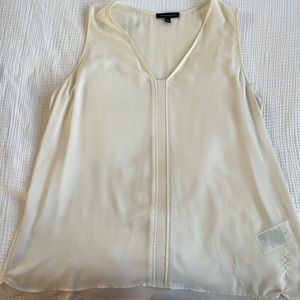 Light airy business casual top with fun leather stripe